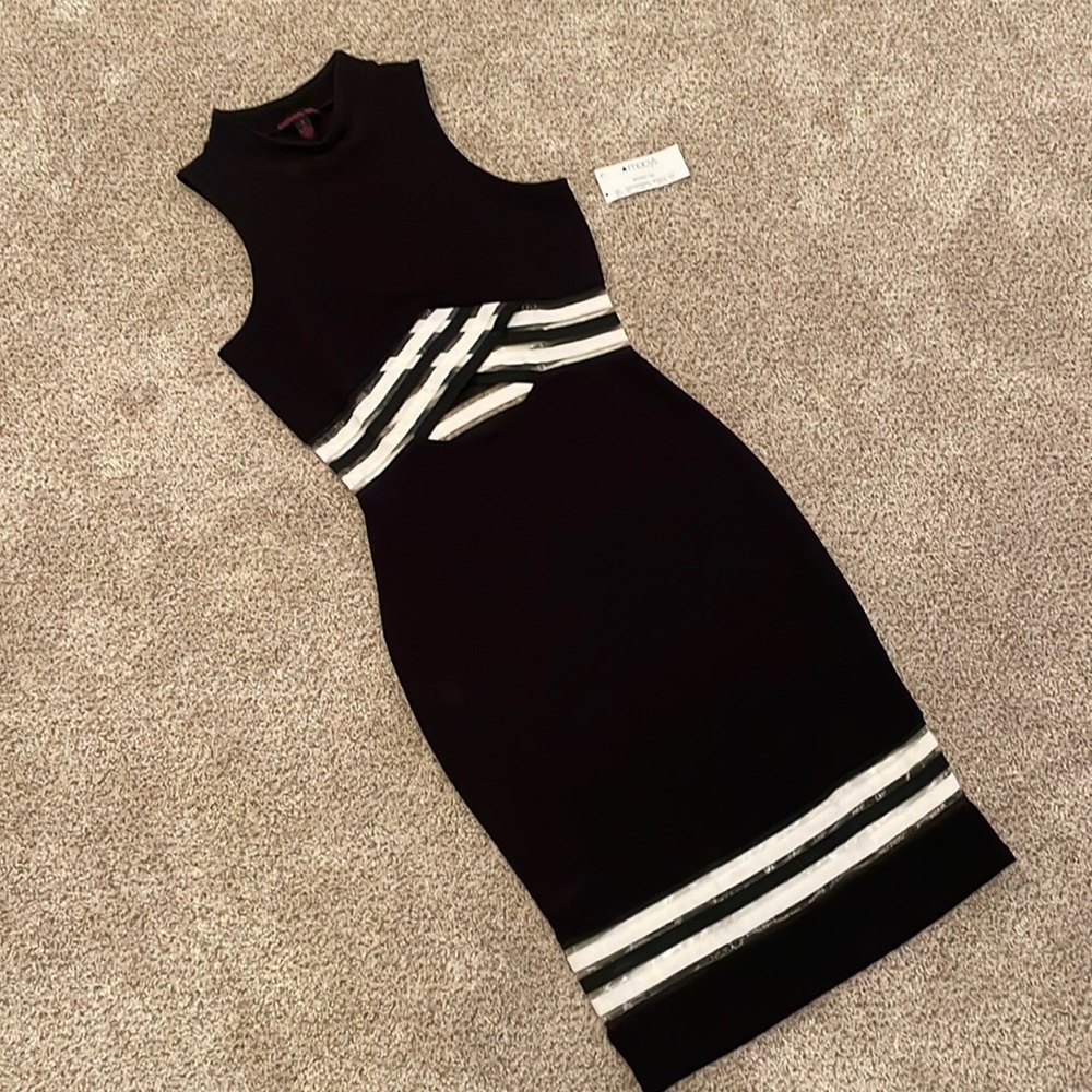 black mid dress with white accent , new with tags